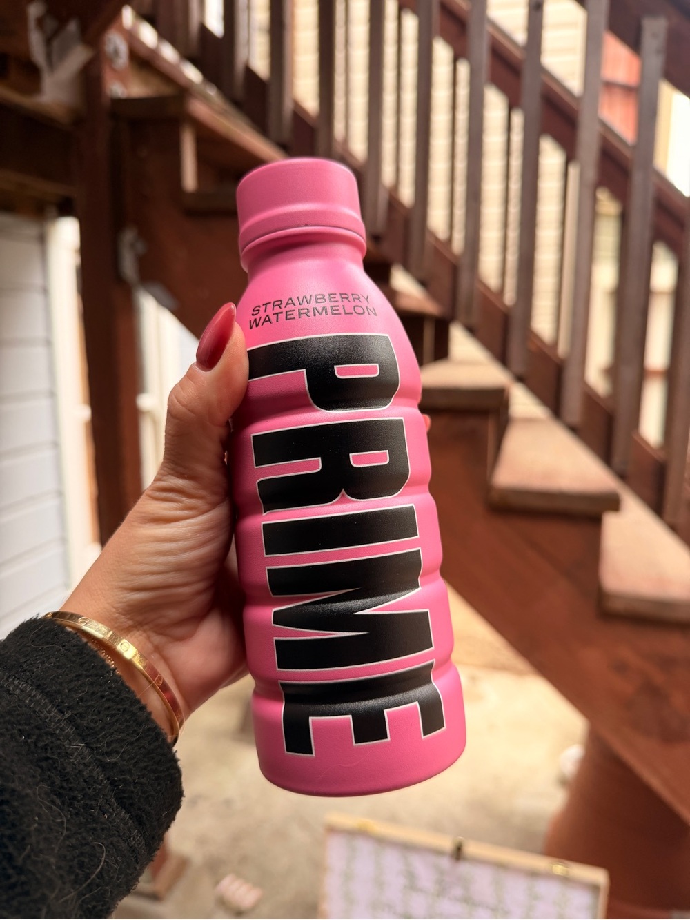 Pink prime energy drink water bottle